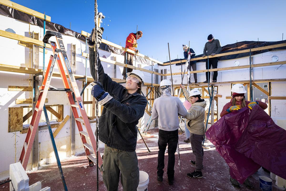 Nate Watson ’26 works at a WSO Priddy Experience community service for a Habitat for Humanity work site in Woodland Park in the Rocky Mountain Southwest on 1/26/23. Photo by Lonnie Timmons III / Colorado College.